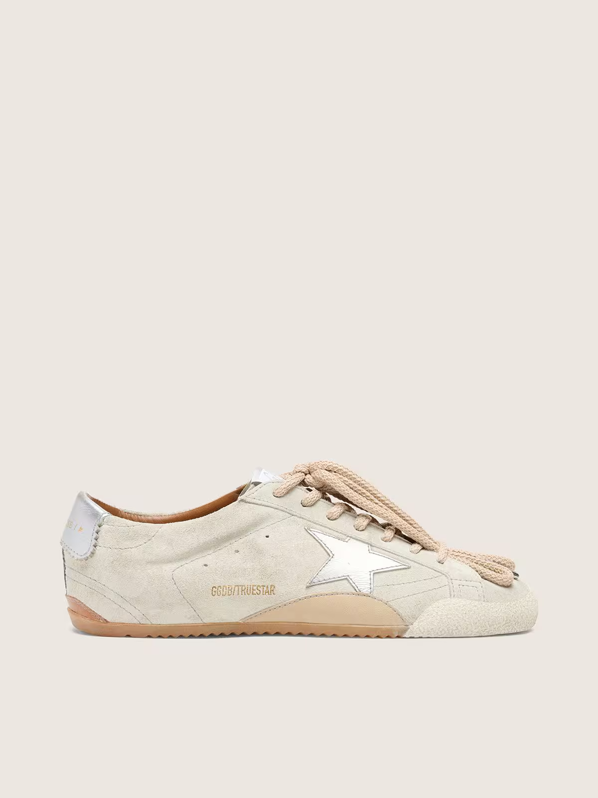 Women's metallic silver star heel tab