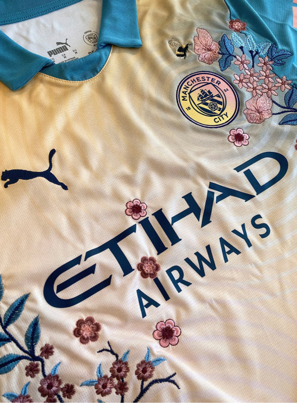 Floral embroidery on the Man City
