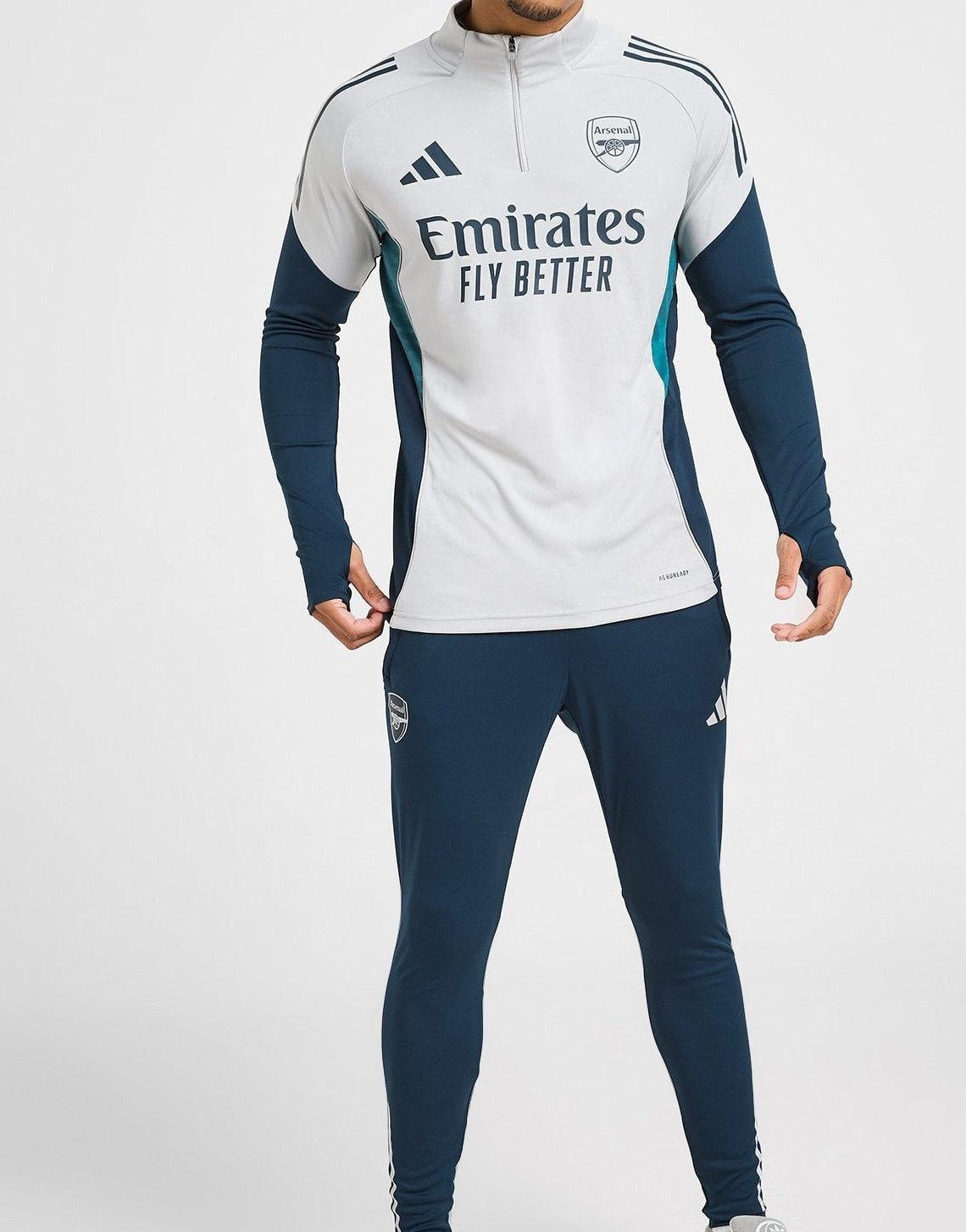 Arsenal FC 2025/2026 training top and track pants set.